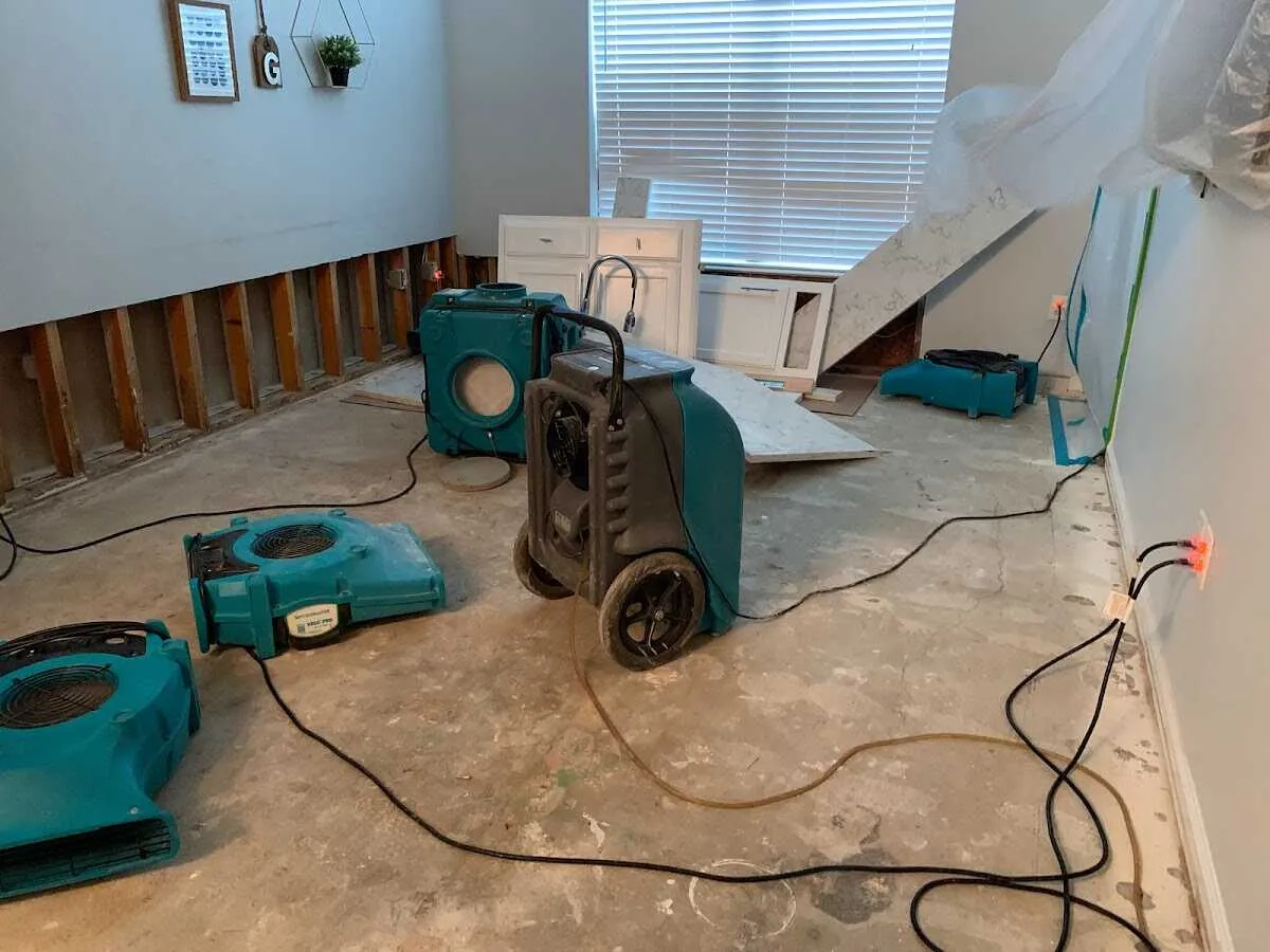 Dehumidifier in flood-cut room for Water Damage Restoration in Hawthorne